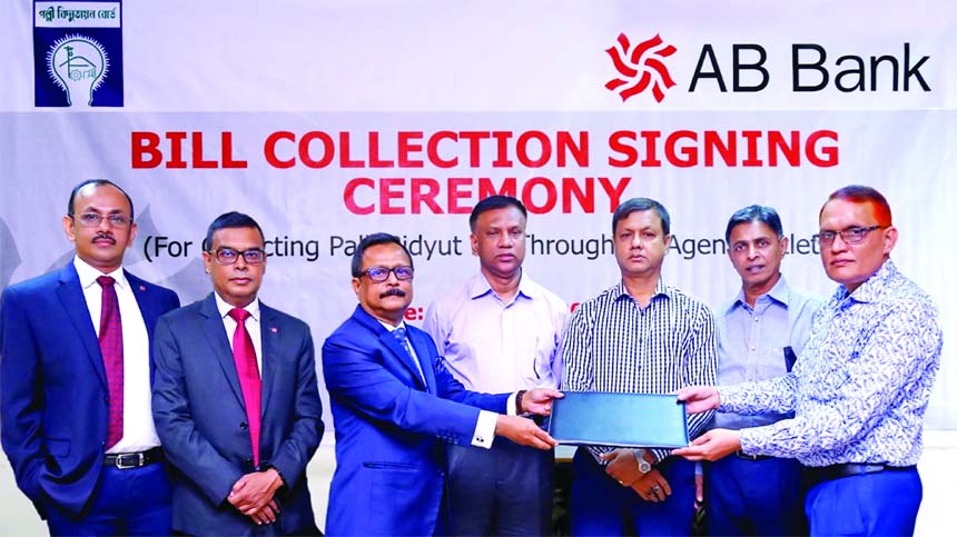 Sajjad Hussain, Deputy Managing Director of AB Bank Limited and Md. Hossain Patwary, Director, Financial Monitoring (Northern Region), Bangladesh Palli Bidyut Board sign an agreement at its head office on Sunday. Under this deal Palli Bidyut customers can
