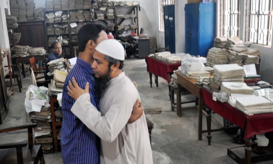 Government officials exchanging greeting after Eid holidays. This snap was taken from Chattogram Post Office on Sunday.