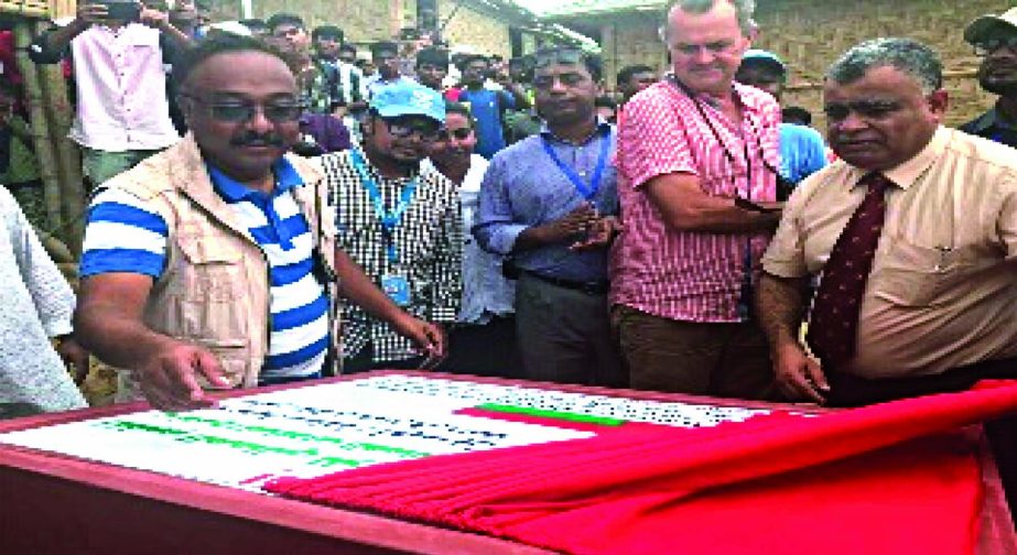 Omani envoy Ta'eeb Salim Al Alawi inaugurated Oman-aided shelters at Chakmarkul, Cox's Bazar recently. The officials of RRRC and UNHCR are also seen during the occasion.