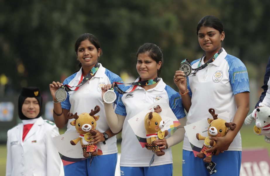 Silver medalists India's Muskan Kirar, Madhumita Kumari and Jyothi Surekha Vennam pose with their medals during the victory ceremony for the archery compound women's team match at the 18th Asian Games in Jakarta, Indonesia on Tuesday.