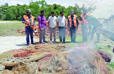 SHARONKHOLA (Bagerhat): Banned current nets were burnt in presence of members of Coast Guard and Fisheries officers at Sarankhla Upazila on Wednesday.