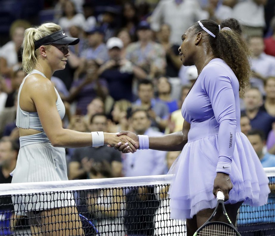 Serena Williams (right) and Carina Witthoeft of Germany, shake hands after Williams won their second round match at the US Open tennis tournament on Wednesday.