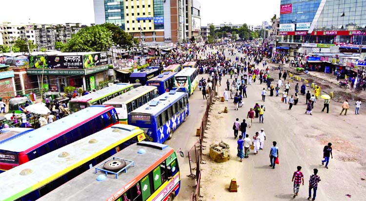 Workers of Top Garment Factories put barricade on Jashimuddin Road in city's Uttara on Thursday protesting retrenchment of about one thousand workers.