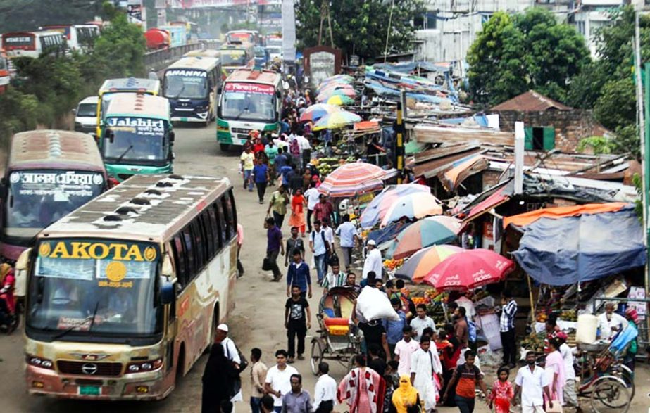 Illegal makeshift shops on both sides of Dhaka-Mymensingh Highway from Abdullapur to Gazipur obstructing free movement of vehicles and passers by. The snap was taken from Abdullapur in the city on Friday.