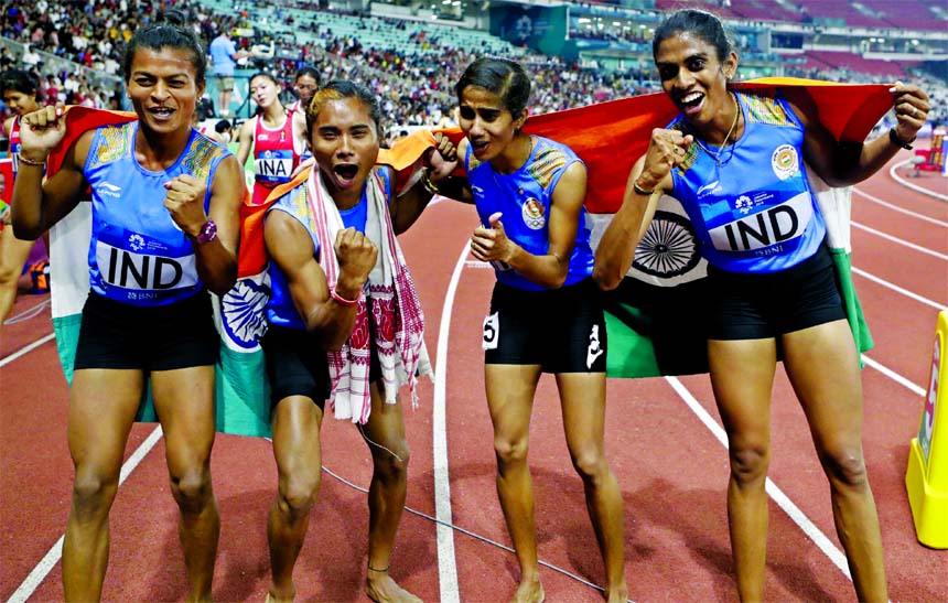 India's womenâ€™s 4x400m relay team celebrate after winning the gold medal during the athletics competition at the 18th Asian Games in Jakarta, Indonesia on Thursday.