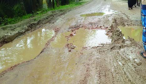 MODHUKHALI (Faridpur): Road at Beashar area at Modhukhali Upazila in dilapidated condition. It needs repair immediately.