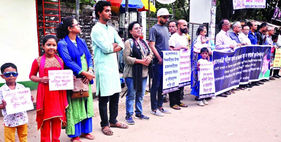 A human chain was formed in front of Jatiya Press Club yesterday demanding release of photographer Shahidul Alam and student leader Faruk.