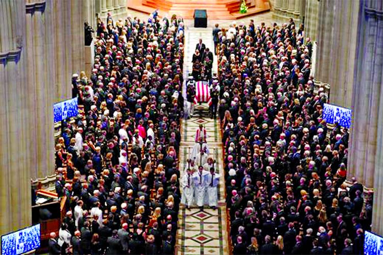 John McCain's widow Cindy and family members follow his casket at the conclusion of his memorial service at the National Cathedral in Washington.