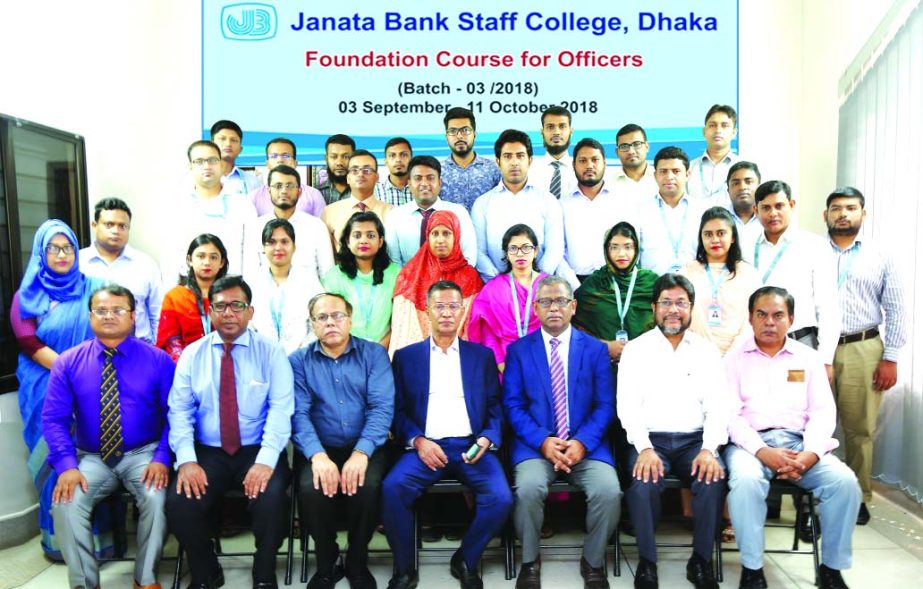 Md. Abdus Salam Azad, Managing Director of Janata Bank Limited, poses for a photo session with the participants of the 'Foundation Course' at the Bank's Staff College in the city on Monday. Md. Zikrul Hoque, DMD of the Bank and Kazi Golam Mostafa, Prin