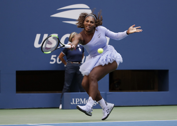 Serena Williams returns a shot to Kaia Kanepi of Estonia, during the fourth round of the US Open tennis tournament in New York on Sunday.