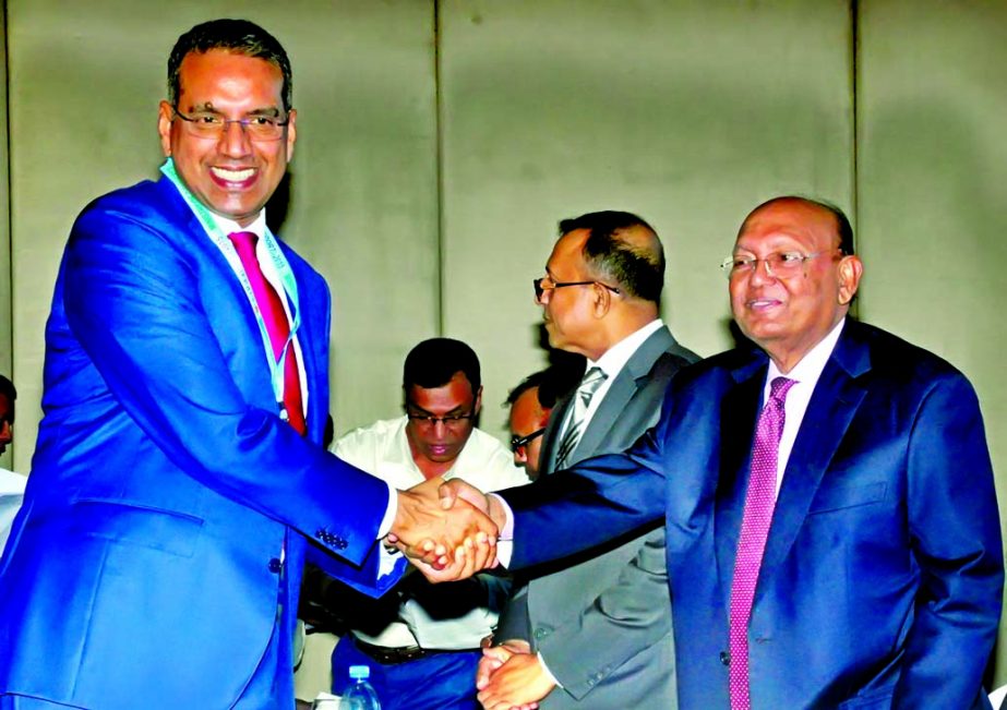 Abdul Muktadir, Managing Director of Incepta Pharmaceuticals Limited, receiving the CIP card for the significant contribution in export business of country from Commerce Minister Tofail Ahmed at a hotel in the city on Monday.