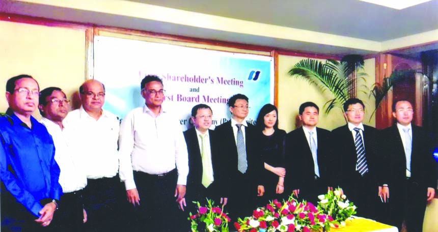 Dr. Ahmad Kaikaus, Secretary of Power Division, poses for a photo session after the 1st board meeting of newly formed Bay of Bengal Power Company Limited at a hotel in the city on Monday. Engineer Khaled Mahmud, Chairman of Power Development Board (PDB),