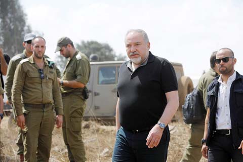 Israeli Defence Minister Avigdor Lieberman visits an army drill in the Israeli-occupied Golan Heights near the border with Syria.