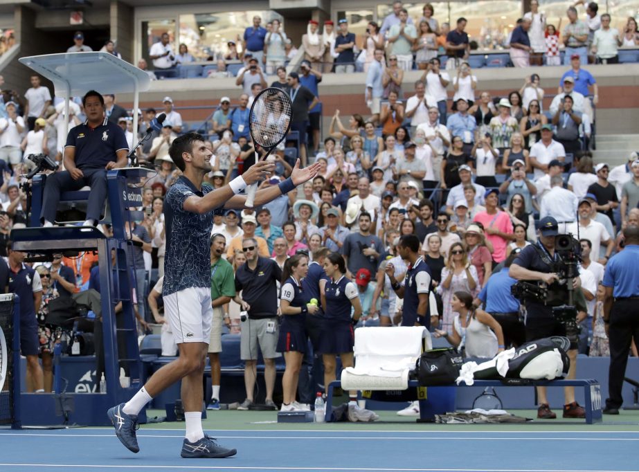 Novak Djokovic of Serbia, reacts after defeating Joao Sousa of Portugal, during the fourth round of the US Open tennis tournament in New York on Monday.