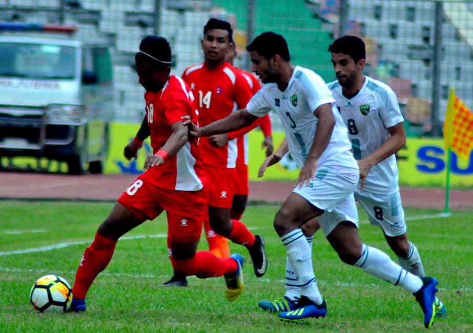 A moment of the match of the SAFF Suzuki Cup Championship between Pakistan National Football team and Nepal National Football team at the Bangabandhu National Stadium on Tuesday.