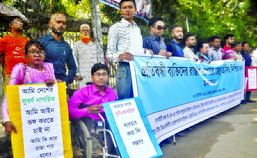 Different organisations formed a human chain in front of the Jatiya Press Club on Wednesday demanding zebra crossing for disabled.