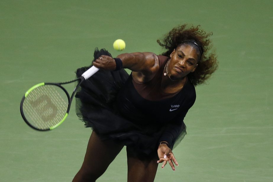 Serena Williams of the United States, serves to Karolina Pliskova of the Czech Republic, during the quarterfinals of the US Open tennis tournament in New York on Tuesday.