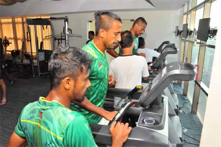 Players of Bangladesh National Football team taking part at the practice session at the Gymnasium in a city hotel on Wednesday.