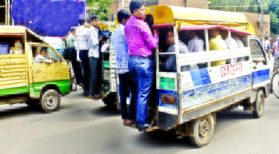Leguna still plying on the city streets despite ban henceforth as directed by the DMP Commissioner on Tuesday to bring discipline in traffic management system. The photo was taken from Azimpur area on Wednesday.