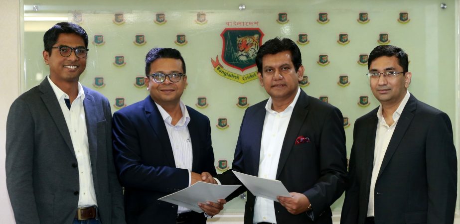 Unilever Bangladesh Limited's Finance Director Zahidul Islam Malita shaking hands with BCB CEO Nizam Uddin Chowdhury (2nd from right) after signing an agreement at BCB Management Office, Sher-e-Bangla National Cricket Stadium in the city's Mirpur on Thu