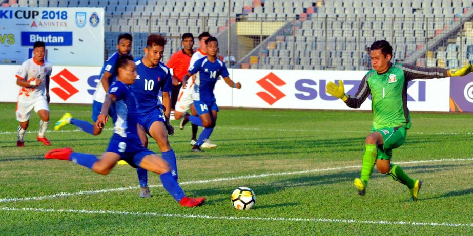 A moment of the match of the SAFF Suzuki Cup Championship between Nepal and Bhutan at the Bangabandhu National Stadium on Thursday. Bhutan defeated Nepal by four goals to nil.
