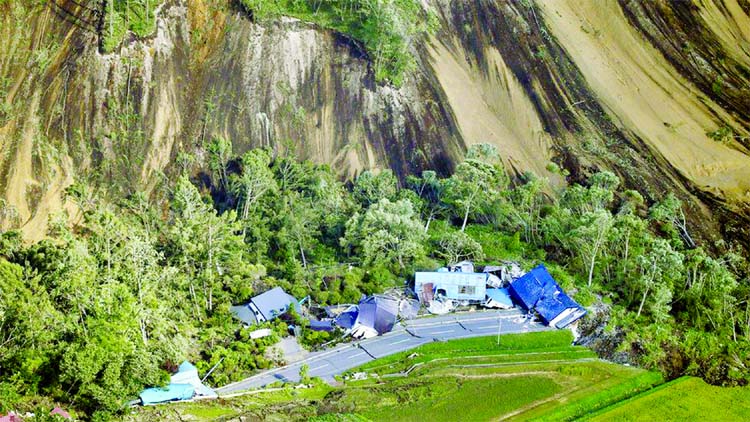 Much of the damage was done by landslides destroying houses and cutting power lines as Japan hit by massive earthquake.