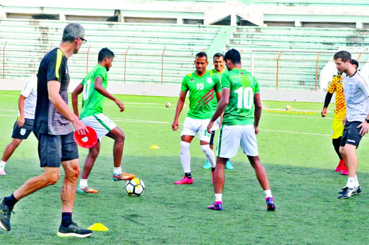 Members of Bangladesh Football team during their practice session at the Bir Shreshtha Shaheed Sepoy Mohammad Mostafa Kamal Stadium in the city's Kamalapur on Friday. Bangladesh will take on Nepal in their last Group-A match of the SAFF Suzuki Cup Champi