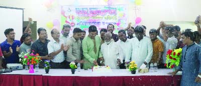 GANGACHHARA (Rangpur ): Upazila Chairman Asaduzzaman Bablu cutting cake marking the 6th founding anniversary of Gangachhara Public Library yesterday.