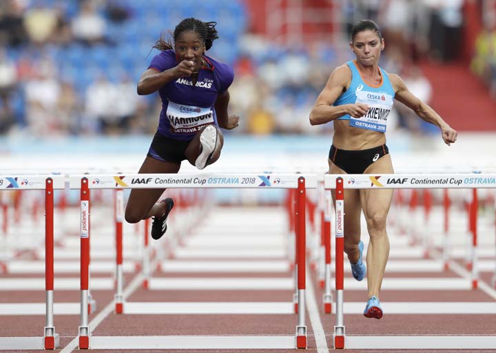 Kendra Harrison of the US (left) and Pamela Dutkiewicz of Germany compete in the women's 100 metres hurdles for the Americas for Europe at the IAAF track and field Continental Cup in Ostrava, Czech Republic on Saturday.
