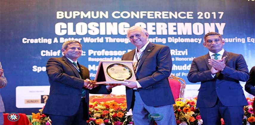 Maj. Gen. Salahuddin Miaji, Former Vice Chancellor of Bangladesh University of Professionals giving a token of appreciation to Prof Gowher Rizvi, International Affairs Adviser to Prime Minister.