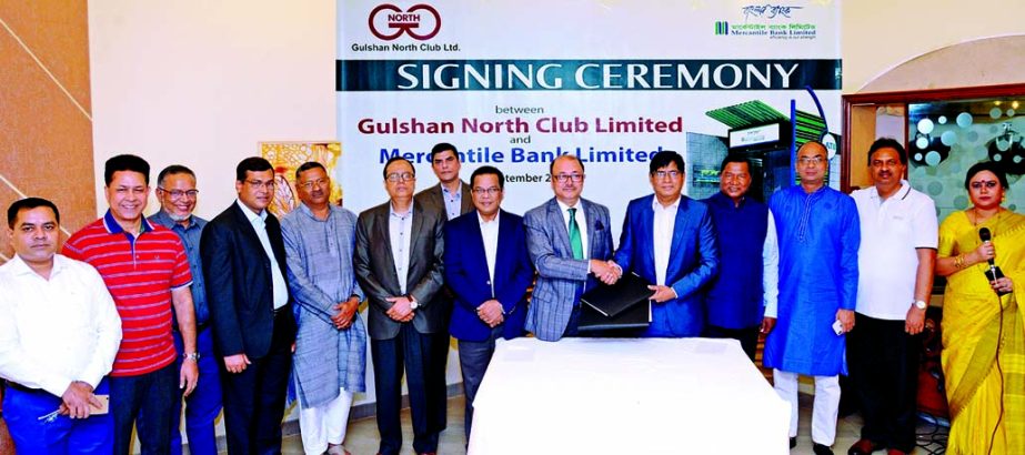 Md. Abu Sakin, Head of Card Division of Mercantile Bank Limited and Khondkar Anisur Rahman, Director of Gulshan North Club, exchanging an agreement signing document to install a Bank's ATM booth at the Club premises on Saturday. M Amanullah, President of