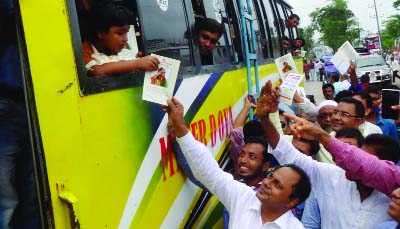 PATUAKHLAI: Dr Md Masumur Rahman, DC, Patuakhali distributing leaftlet for creating awareness on road safety among passengers yesterday.