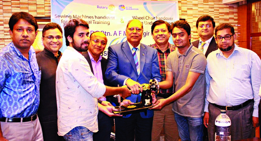 AFM Alamgir, DG of Rotary International District,3281 Bangladeh, handing over sewing machines to the authorities of Switch Bidya Niketon at Hotel Bengal Canary Park in the city organised by Rotary Club Basundhara recently.