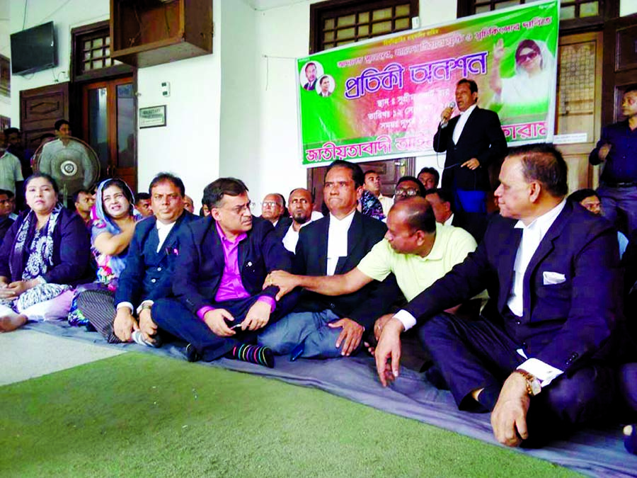 Pro-BNP lawyers staged a sit-in on the Supreme Court premises on Wednesday demanding release and treatment of BNP Chief Begum Khaleda Zia and transfer of the court from Old Dhaka Central Jail.