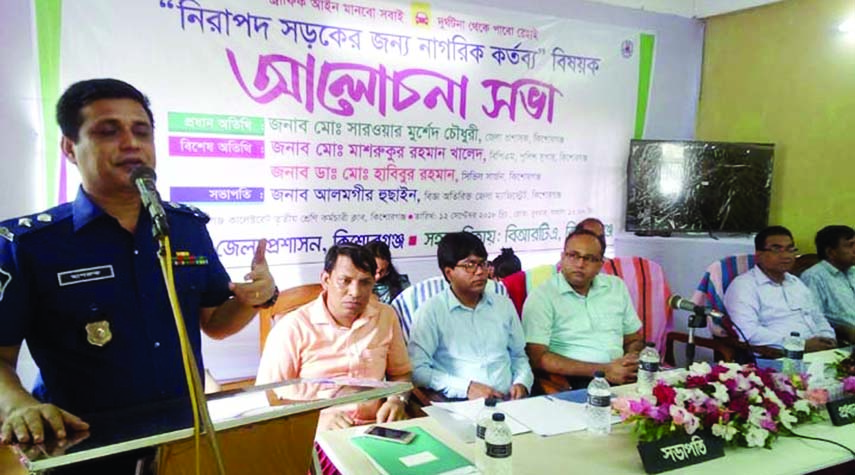 KISHOREGANJ: Md Masrukur Rahman Khaled, SP, Kishoreganj addressing a discussion on road safety for citizen awareness at Kishoreganj Collectorate Staff Club Auditorium organised by Bangladesh Road Transport Authority (BRTA) on Wednesday.