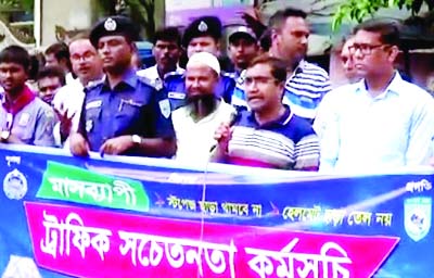 SAGHATA (Gaibandha): Uzzal Kumar Gosh, UNO, Saghata Upazila speaking at a rally organised to raise awareness on traffic rules recently.