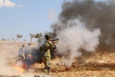 A rebel fighter from the Turkish-backed National Liberation Front takes part in combat training in Syria's last major rebel bastion Idlib.