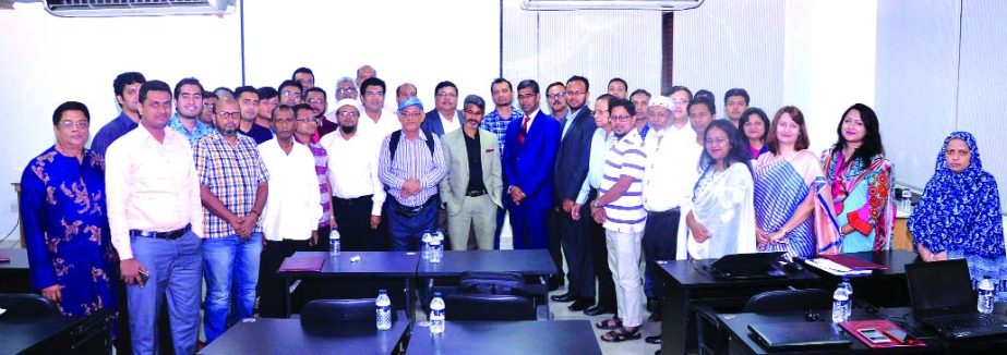 Md. Arfan Ali, Chairman of Bank Asia Limited, poses for a photo session as chief guest with the participants of a 'workshop on Advanced Excel and Financial Modeling' organized by ICAB at its office in the city recently. Mahmudul Hasan Khusru, Mahamud H