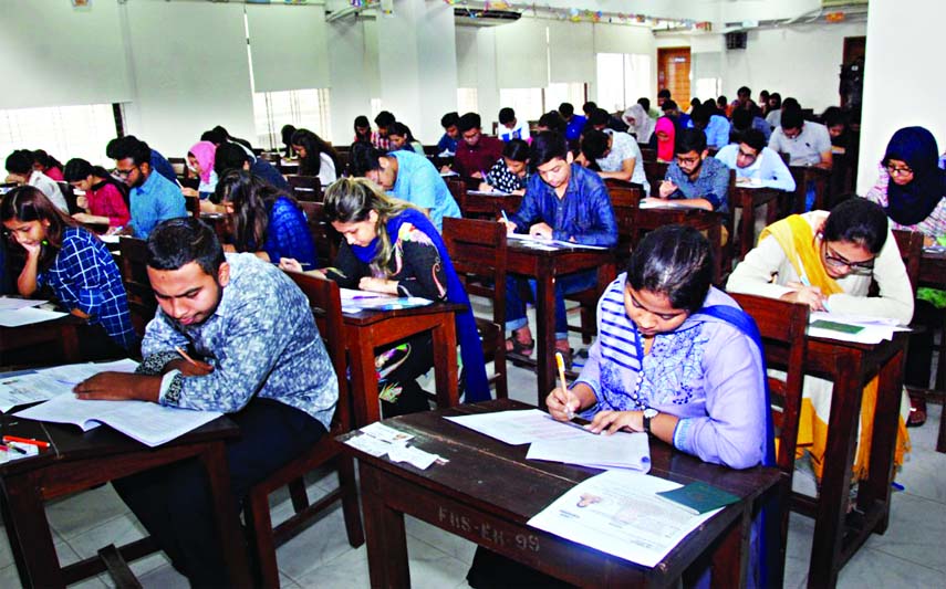 Students sit for Dhaka University admission test under 'Ga' unit. The snap was taken from Kalabhaban of the university on Friday.