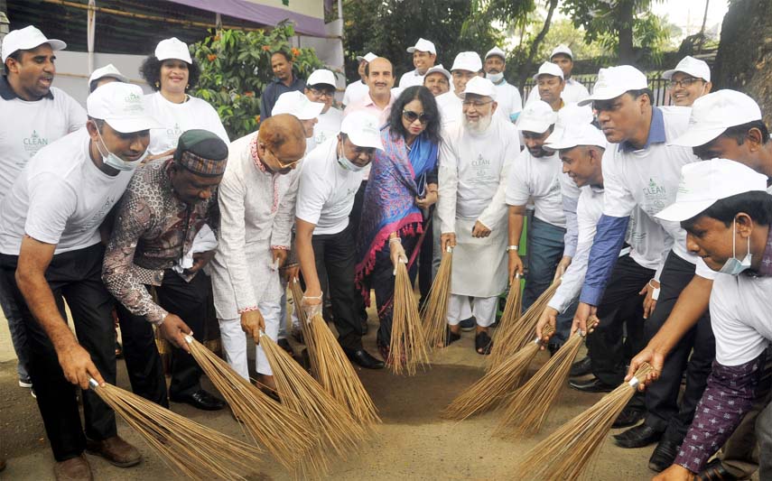 General Secretary of the Jatiya Press Club Farida Yasmin inaugurating the cleanliness drive organised by different organisations including Clean Bangladesh on the club premises on Friday