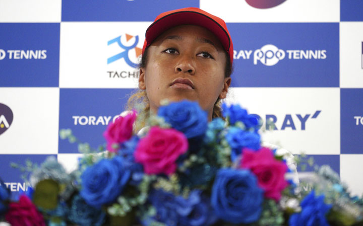 US Open women's singles champion Naomi Osaka attends a press conference prior to the Pan Pacific Open tennis tournament in Tokyo on Monday. Osaka defeated Serena Williams of the US on Saturday to become the first Grand Slam singles champion from Japan.