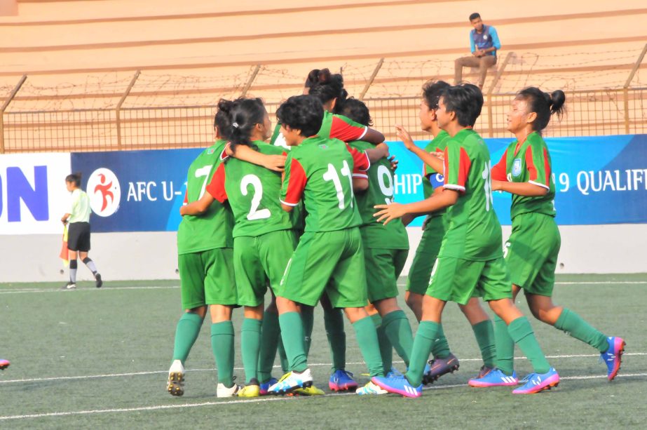 Players of Bangladesh Under-16 National Women's Football team celebrating after scoring a goal against Bahrain Under-16 National Women's Football team in their match of the AFC Under-16 Women's Championship Qualifiers at the Bir Shreshtha Shaheed Sepoy