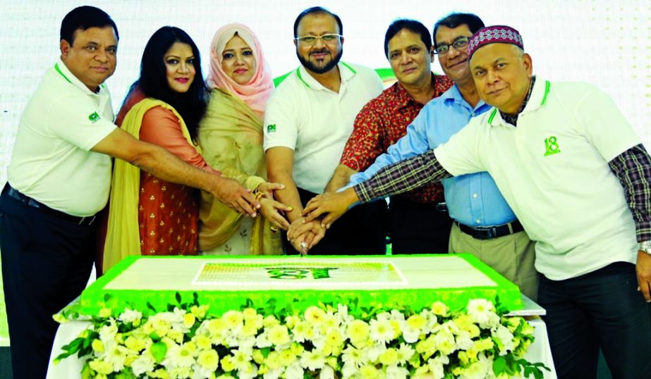 Md. Momin Ud Dowlah, Chairman and Managing Director of Eon Group of Industries Limited, inaugurating its 18th anniversary celebrating programme by cutting cake at Eon Convention Center in the city on Sunday. Major ABA Mesbah Ud Dowlah, Vice-Chairman, ABA