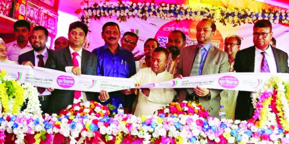 Jafar Alam, Chokoria Upazila Chairman, inaugurating an Agent Banking outlet of Islami Bank Bangladesh Limited as chief guest at Badarkhali Bazar of the Upazila recently. Mohammad Monirul Moula, AMD, Md. Nizamul Haque, EVP, Mohammed Shabbir, SVP of the Ban