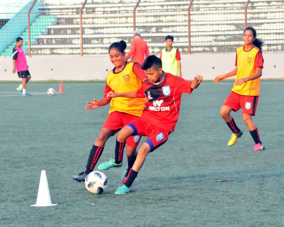 Members of Bangladesh Under-16 Women's Football team during their practice session at the Bir Shreshtha Shaheed Sepoy Mohammad Mostafa Kamal Stadium in the city's Kamalapur on Tuesday.