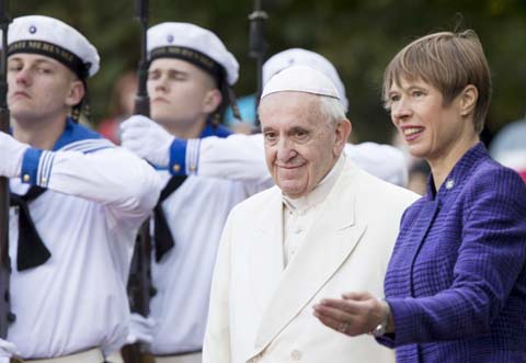 President of Estonia Kersti Kaljulaid, right, welcomes Pope Francis as he arrives at the Kadriorg Presidential Palace in Tallinn, Estonia on Tuesday.