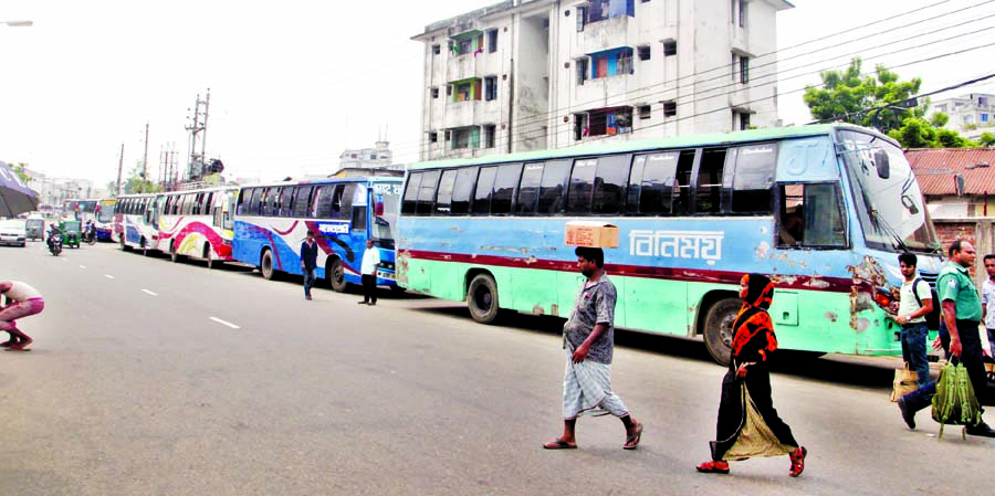 Transport workers of the city's Mohakhali Bus Terminal stopped the plying of buses from Tuesday morning centering beating of a bus driver in the terminal area.