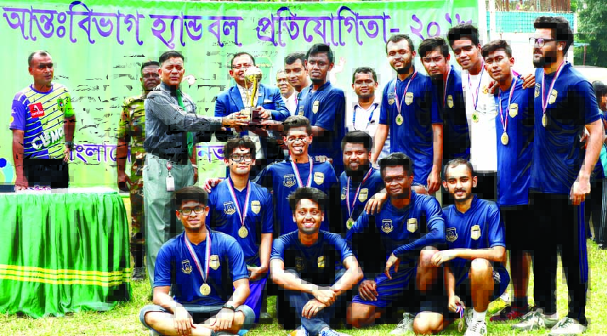Members of Economics Department, the champions of the Inter-Department Handball Competition of Bangladesh University of Professionals (BUP) pose for photograph at the BUP Ground in the city on Tuesday.