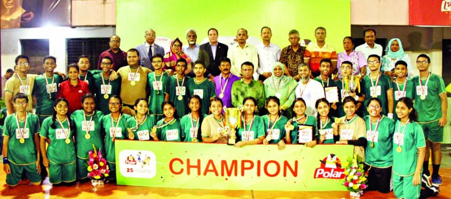 Sunnydale, the champions of the Boys' Group, Viqarunnisa Noon School & College, the champions of the Girls' Group of the Polar Ice Cream 25th School Handball Tournament with the guests and officials of Bangladesh Handball Federation pose for a photo ses