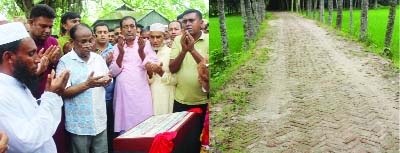 BHALUKA (Mymensingh): Prof Dr M Amanullah MP offering Munajat after inaugurating the newly constructed link road from Palgaon Bazar to Kachina Hospital as Chief Guest recently.